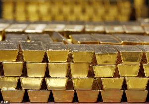Glittering returns: Bullion raced to $4103 an ounce - taking gains for the year to a 57% - as nervous investors continue to look for somewhere safe to park their cash