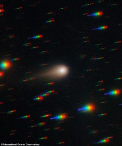 Comet 3I/ATLAS streaks across a dense star field in this image captured by a telescope in Chile