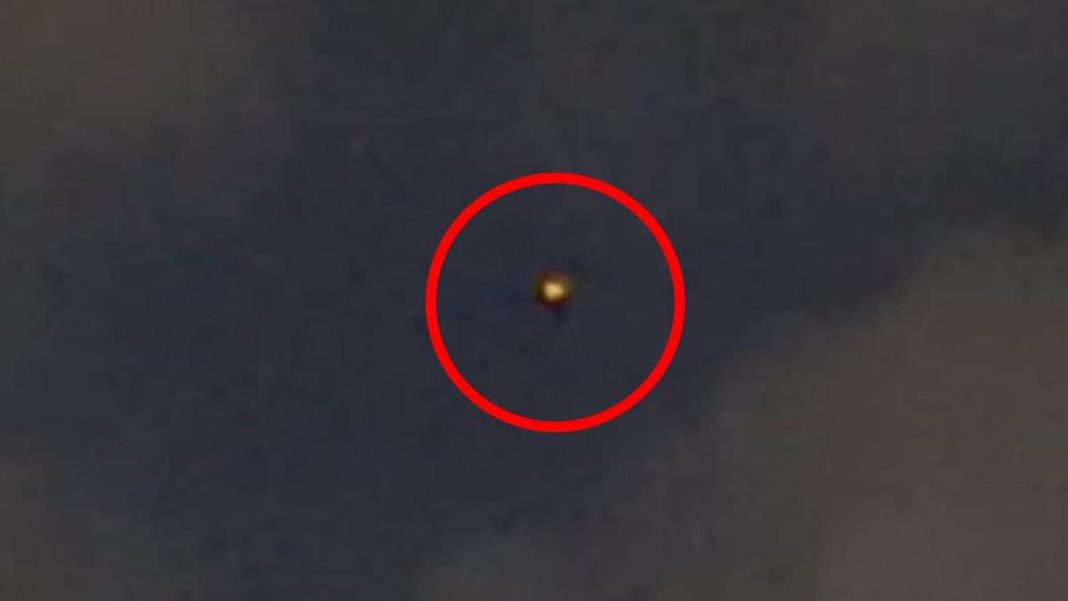 Three police officers in Minneapolis, Minnesota issued a report after seeing a spherical Unidentified Aerial Phenomena (UAP) with six glowing rings that changed colors