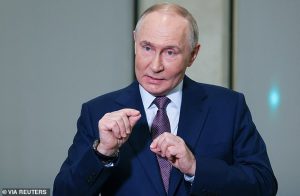Oil money: Russian President Vladimir Putin met with journalists on Thursday to comment on new U.S. sanctions targeting two major Russia's oil producers