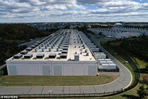 In Virginia, dozens of data centers have been approved or built, among the 1,240 spread across the US. Pictured is an aerial view of an Amazon Web Services Data Center known as US East 1 in Ashburn, Virginia