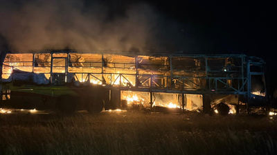 A private bus operated by Kaveri Travels caught fire on the Hyderabad–Bengaluru highway near Kurnool, with at least 32 people feared dead. The blaze erupted after the bus collided with a motorcycle, trapping passengers inside. Rescue efforts are ongoing as officials work to confirm the exact casualty count.