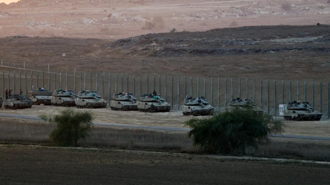 Israeli military vehicles stand on the Israeli side of the border with Gaza, in Israel, on October 19, 2025. | Photo Credit: Reuters
