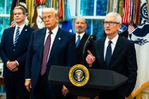 Apple CEO Tim Cook with President Donald Trump in the Oval Office on Aug. 6. Demetrius Freeman / The Washington Post via Getty Images