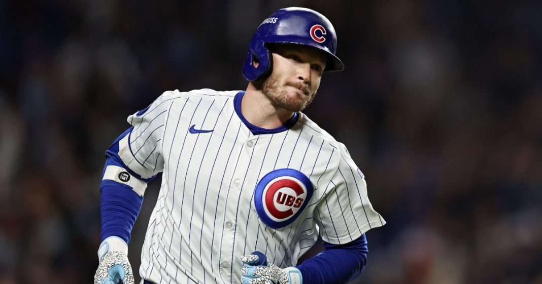 Ian Happ of the Chicago Cubs rounds the bases after hitting a home run during the first inning against the Milwaukee Brewers at Wrigley Field in Chicago on Thursday.
