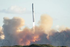 SpaceX's Starship rocket launches during the 11th test flight Monday, as seen from South Padre Island in Texas. Gabriel Cardenas / AFP via Getty Images