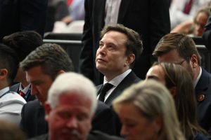 Elon Musk attends the memorial service for Charlie Kirk at State Farm Stadium in Glendale, Arizona, on Sept 21, 2025. (Photo: New York Times)