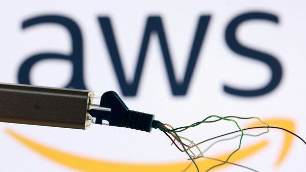 AWS logo and broken ethernet cable are seen in this illustration taken October 20, 2025. REUTERS/Dado Ruvic/Illustration