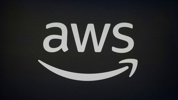 FILE - An AWS, Amazon Web Services, logo is displayed at LlamaCon 2025, an AI developer conference, in Menlo Park, Calif., Tuesday, April 29, 2025. (AP Photo/Jeff Chiu, File)