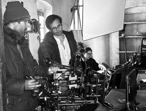 Director Aranya Sahay manning the camera and looking at the rushes on the set during the shoot. (Courtesy Aranya Sahay)
