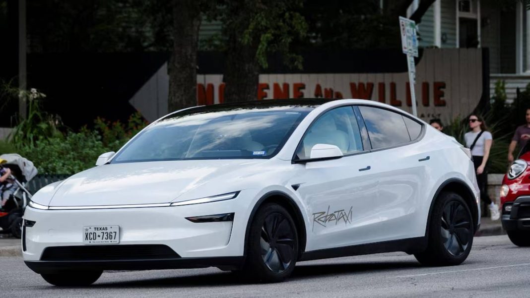 A Tesla robotaxi drives on the street along South Congress Avenue in Austin, Texas, U.S., June 22, 2025. (Photo source: Reuters)