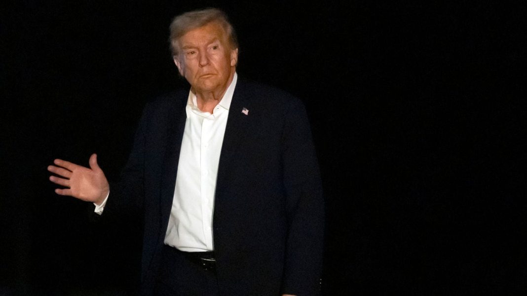 President Donald Trump walks across the South Lawn of the White House, early Tuesday, Oct. 14, 2025, in Washington, after returning from a trip to Israel and Egypt. (AP Photo)