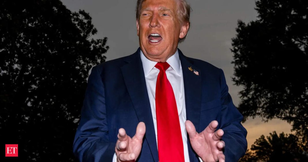 President Donald Trump speaks with reporters before departing on Marine One from the South Lawn of the White House, Tuesday, Sept. 30, 2025, in Washington. (AP Photo)