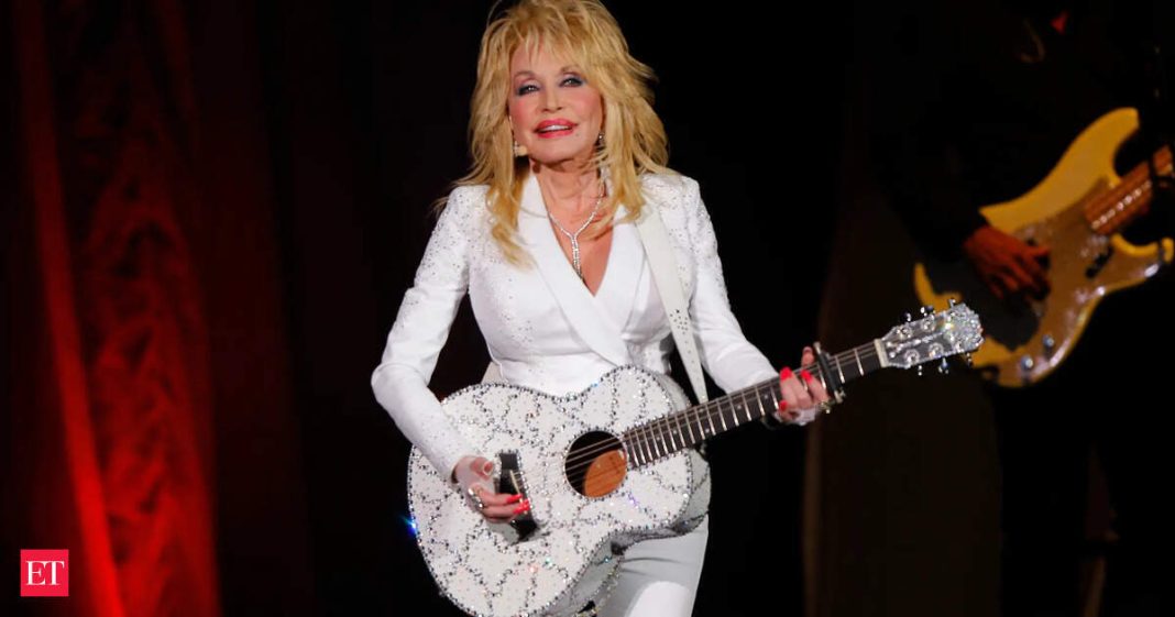 FILE - Dolly Parton performs in concert on July 31, 2015, in Nashville, Tenn. (Photo by Wade Payne/Invision/AP, File)