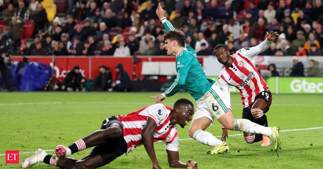Liverpool's Milos Kerkez celebrates scoring his team's first goal during the Premier League match between Brentford and Liverpool.