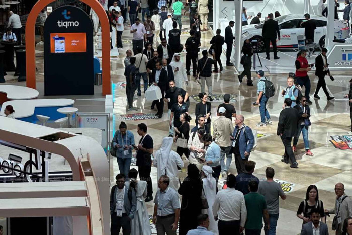 Participants roam the displays at GITEX Global 2025 in Dubai, where the Thai government promoted a group of local startups looking for trade deals. Boonsong Lipimas