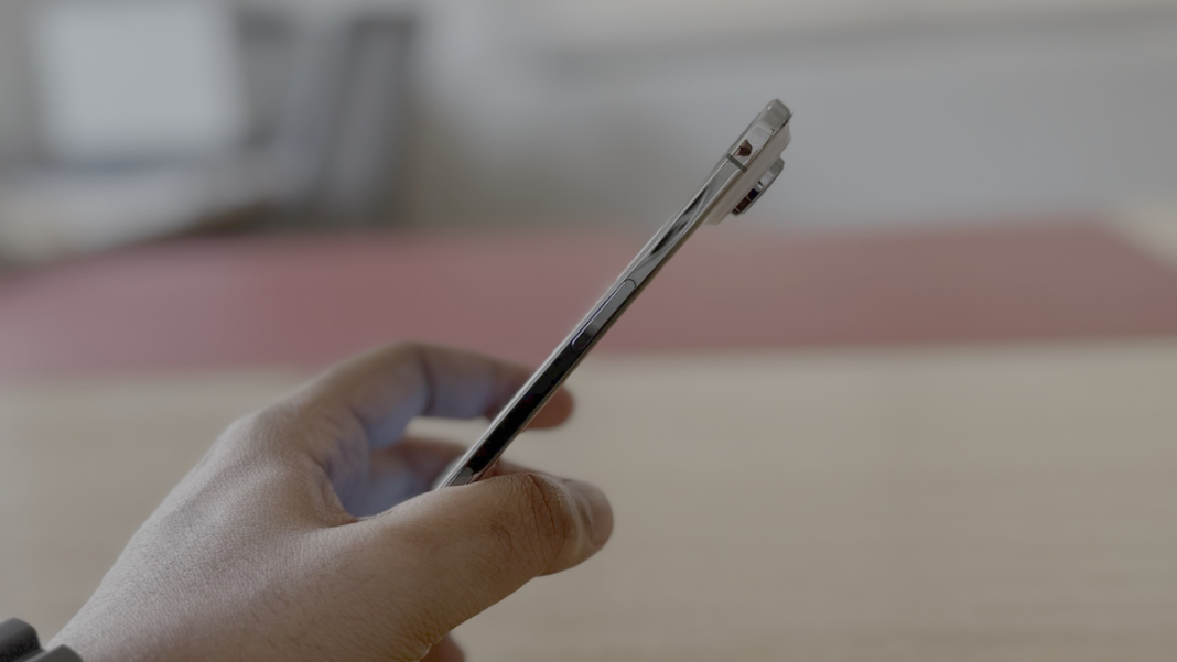 Apple’s internal rethinking pushes nearly all physical components to the camera bump up on top, leaving most of the body as battery | Photo Credit: John Xavier