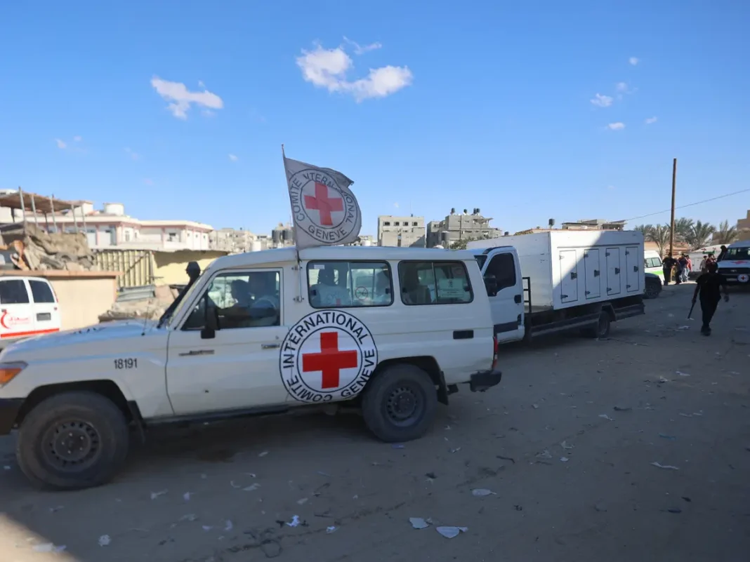 Red Crescent vehicles and refrigerated trucks, transporting the bodies of 45 Palestinians that had been in Israeli custody, arrive at the Nasser hospital in Khan Yunis in the southern Gaza Strip on October 14, 2025.