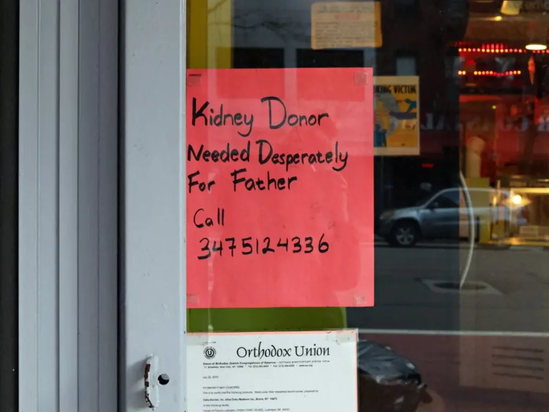 A sign in a restaurant window reads 'kidney donor needed desperately for father' during the COVID-19 pandemic on April 21, 2020 in New York City.