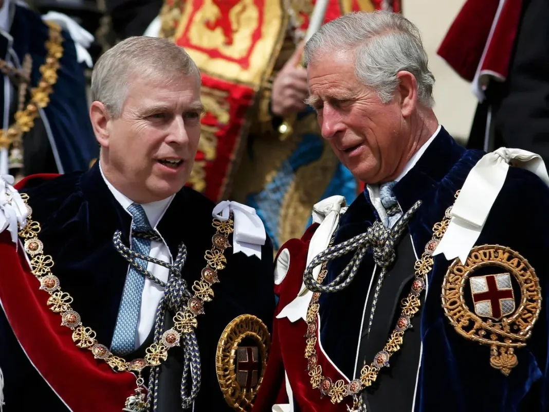 File Photo: Britain's Prince Andrew (L) and King Charles attend the Most Noble Order of the Garter Ceremony at Windsor Castle in southern England, on June 15, 2015.