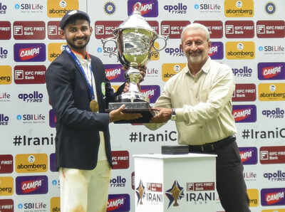 Nagpur: Vidarbha's captain Akshay Wadkar receives the championship trophy after defeating Rest of India in the Irani Cup 2025 cricket match, at Vidarbha Cricket Association (VCA) Stadium, in Nagpur, Maharashtra. (PTI Photo) (PTI10_05_2025_000290B)