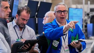 US stocks hit new peaks (AP)