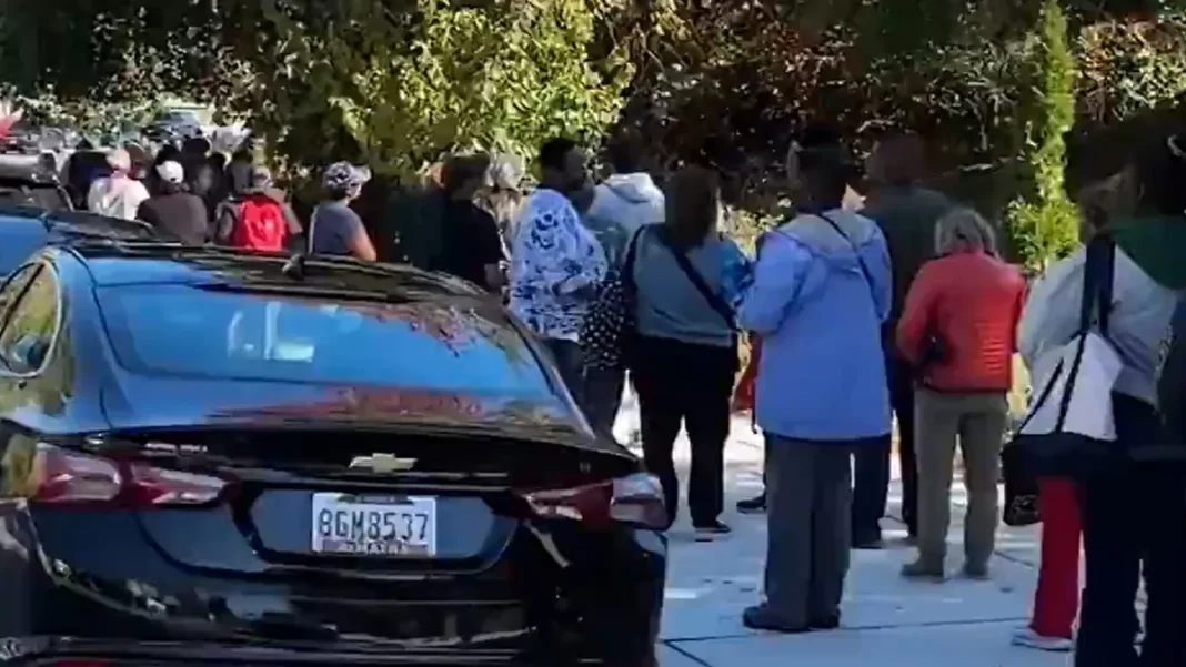 Workers, military families stand in long queues outside food banks.