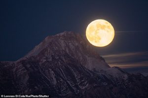 Last year's November supermoon rising behind Corno Grande in Italy. The first full moon of November is informally called a Beaver moon, as part of a tradition dating back centuries