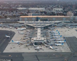 Newark Liberty Airport in New Jersey (Pictured) is among dozens of airports affected by the slowdown in flights caused by the government shutdown