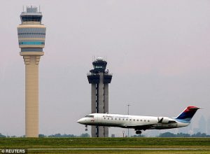 The air traffic control tower at Hartsfield-Jackson Atlanta International Airport (Pictured) was briefly evacuated due to strong thunderstorms in the area Tuesday morning