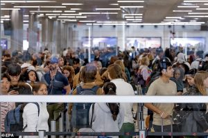 Hartsfield-Jackson Atlanta International Airport (Pictured), the nation's busiest travel hub, has seen extremely long lines as Americans take off for the Thanksgiving weekend