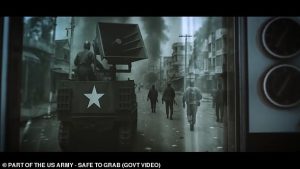 Another part of the video conveys the idea of blasting messages to the public as soldiers move through worn-torn towns