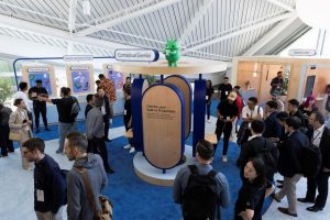 Attendants try the new Gemini AI model features at a Made by Google event in Mountain View, California, on August 13, 2024.