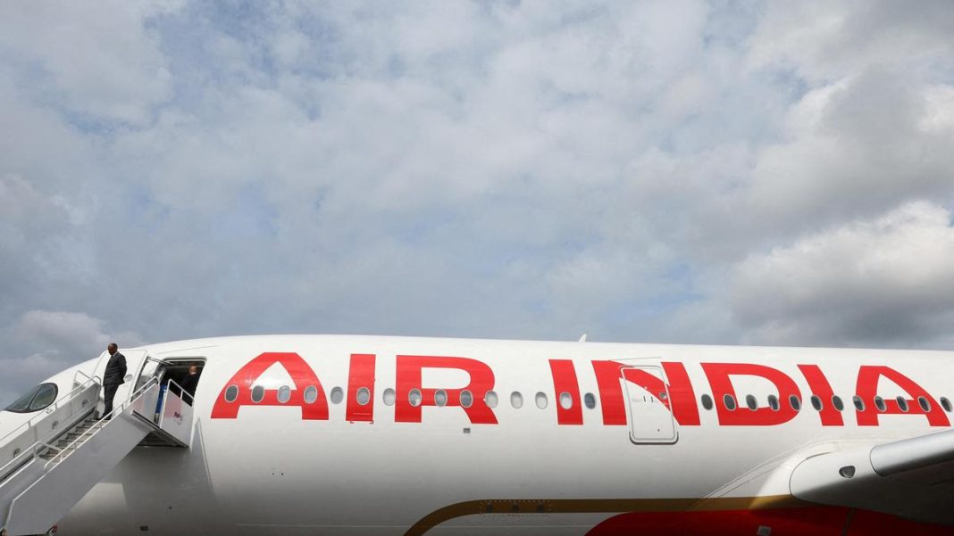 FILE PHOTO: Branding for Air India is seen on an Airbus A350-900 at the Farnborough International Airshow, in Farnborough, Britain, July 24, 2024. REUTERS/Toby Melville/File Photo | Photo Credit: TOBY MELVILLE