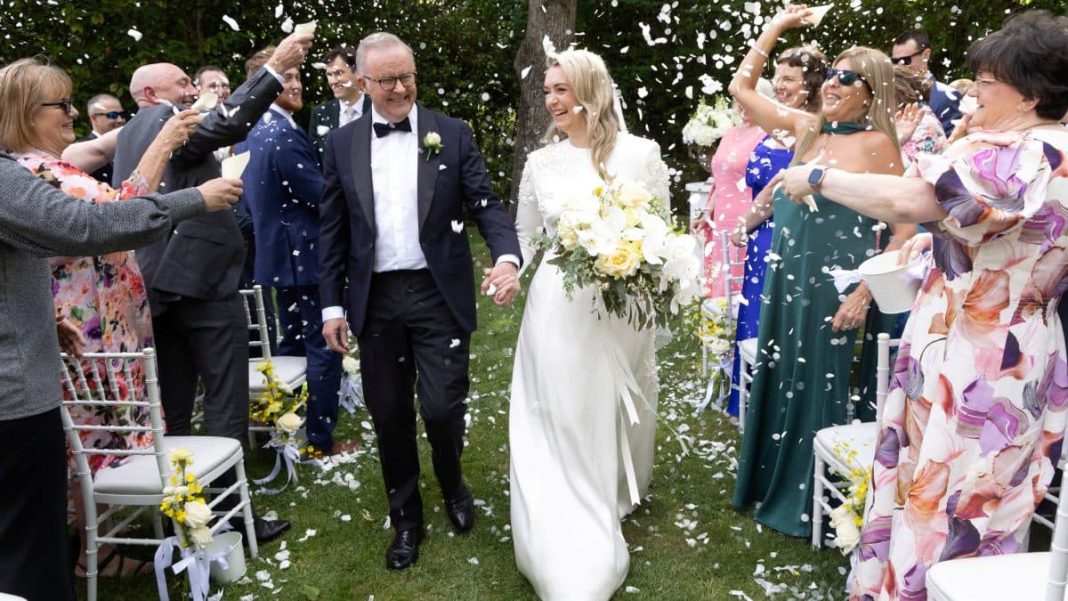 Australian Prime Minister Anthony Albanese and Jodie Haydon walk down the aisle after getting married in Canberra, Australia, November 29, 2025. Mike Bowers for PMO/Handout via REUTERS