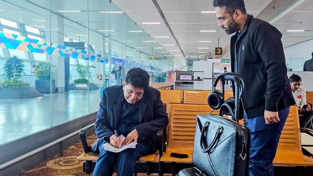 Union Commerce and Industry Minister Piyush Goyal waits to board his flight to Auckland, New Zealand, at Indira Gandhi International Airport, in New Delhi on November 4, 2025. | Photo Credit: ANI