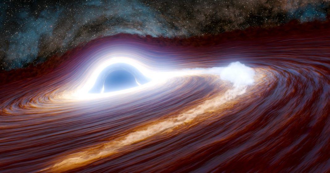 This artist's concept depicts a supermassive black hole in the process of shredding a massive star — at least 30 times the mass of our sun —to pieces.