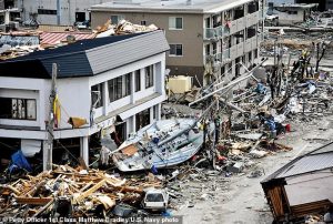 A magnitude 9 earthquake in the northwest US could destroy half a million homes and cause the deaths of countless people. Pictured: Aftermath of the 9.0 quake that struck Japan in 2011