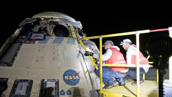File photo of Boeing and NASA teams working around NASA's Boeing Crew Flight Test Starliner spacecraft after it landed uncrewed on September 6, 2024, at White Sands, New Mexico, after undocking from the International Space Station.