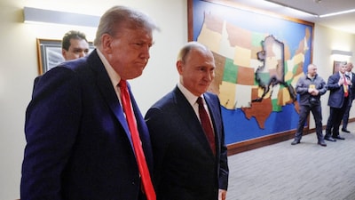 US President Donald Trump and Russian President Vladimir Putin walk to a joint news conference following their meeting at Joint Base Elmendorf-Richardson in Anchorage, Alaska, US. (IMAGE: REUTERS FILE)