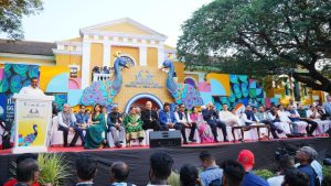 Chief guests, film personalities and other dignitaries await the opening carnival parade at the 56th International Film Festival of India, Goa