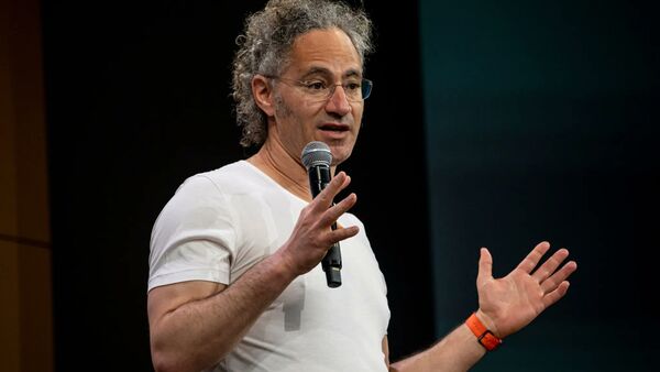 Palantir's Karp defends free speech in earnings call.