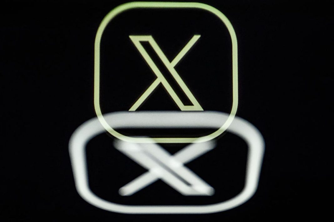 The X logo pictured in Nantes, France, on 7 March, 2024 (AFP via Getty Images)