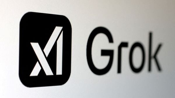 FILE PHOTO: xAI and Grok logos are seen in this illustration taken, February 16, 2025. REUTERS/Dado Ruvic/Illustration/File Photo