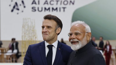 France's President Emmanuel Macron and Prime minister Narendra Modi arrive for a plenary session at the Artificial Intelligence (AI) Action Summit, at the Grand Palais, in Paris. (IMAGE: AFP FILE)