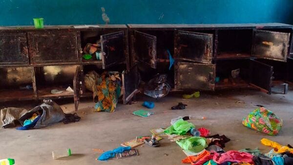 This handout photo shows open lockers and scattered personal belongings inside a dormitory at St. Mary's Catholic School in Papiri town in Agwarra local government, Niger state.
