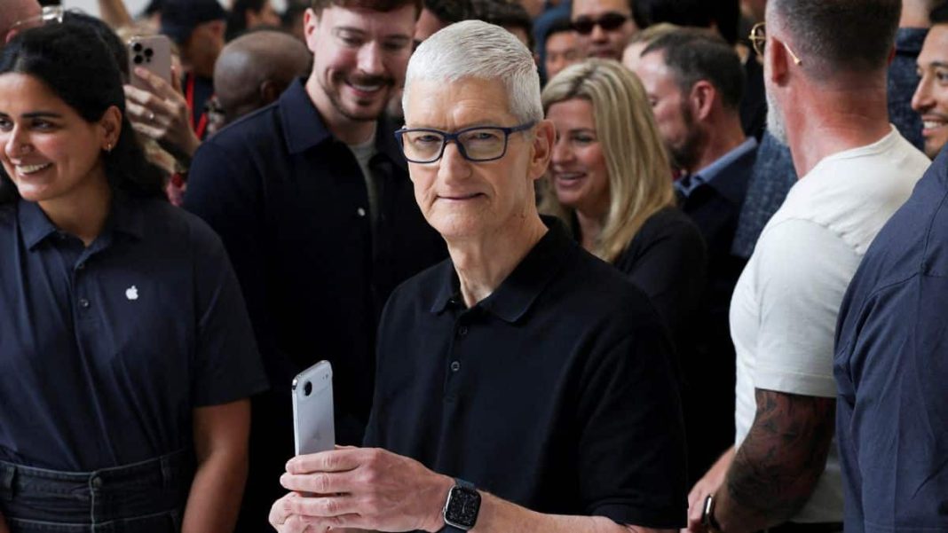 Apple CEO Tim Cook holds an iPhone Air, as Apple holds an event at the Steve Jobs Theater on its campus in Cupertino, California, US, September 9, 2025. File Image/Reuters