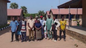 In this photo released by Christian Association of Nigeria, people pose for a photograph at St. Mary’s Catholic Primary and Secondary School after gunmen abducted children and staff in Papiri community, Nigeria, Friday, Nov. 21, 2025. (Christian Association of Nigeria via AP)