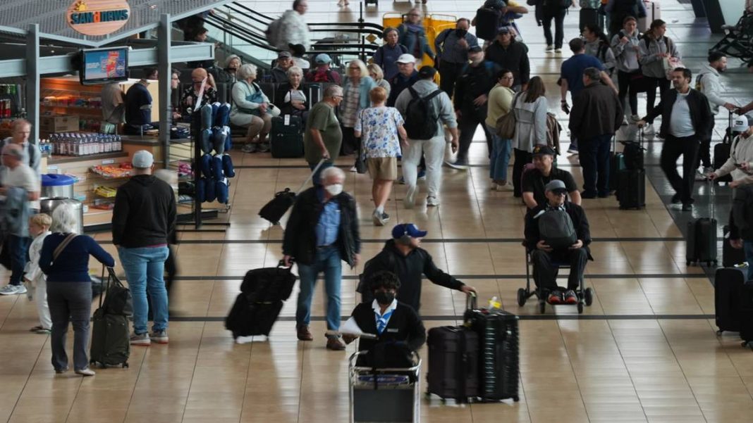 People make their way through a terminal at San Diego International Airport Saturday, Nov. 8, 2025, in San Diego. (Photo source: AP)