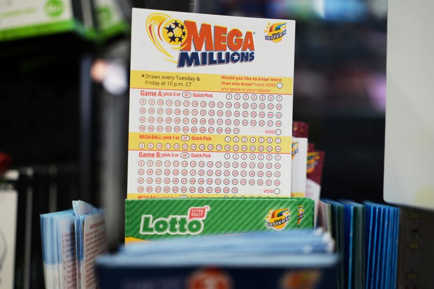 Mega Millions Lottery play slips are displayed for customers at a convenience store in Chicago in April.